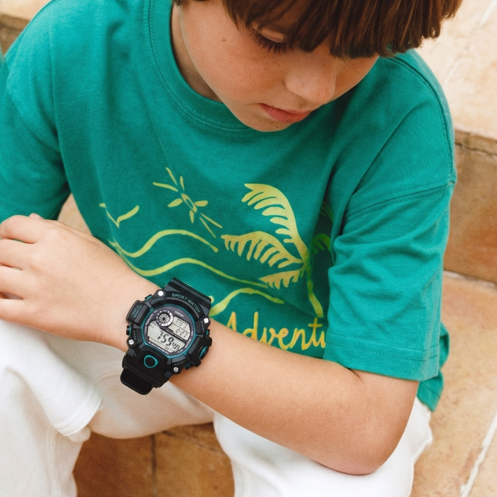 Kids sports watch showing time day and date display