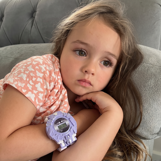 Kids digital watch folds into a robot figure
