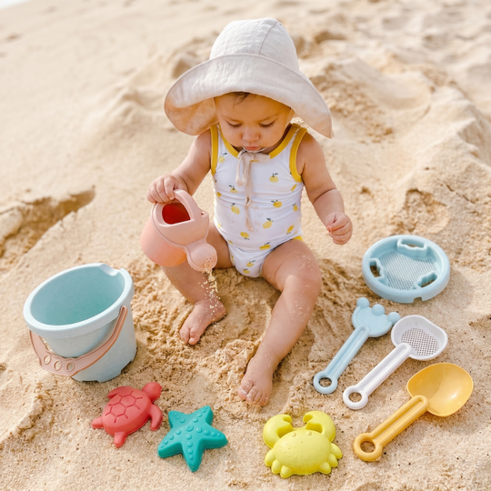Kids beach toy set with watering can and moulds