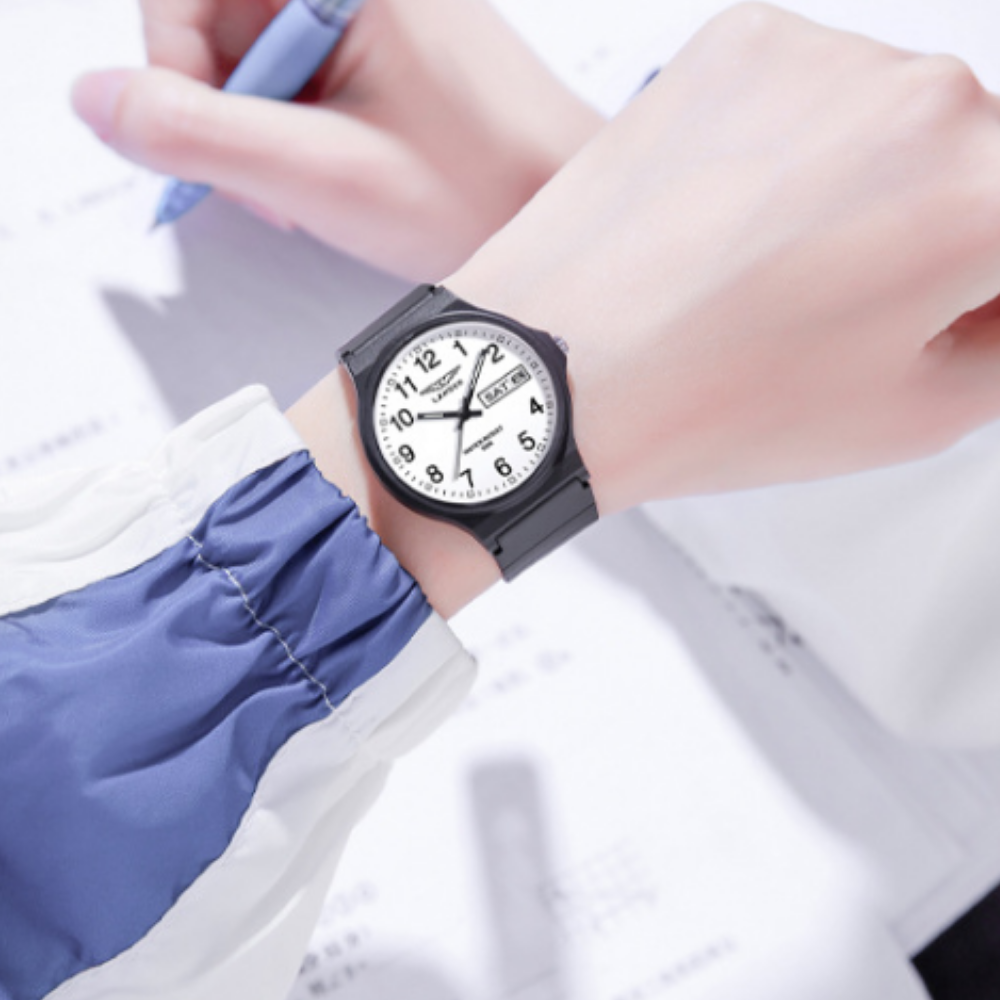 Quartz sports watch with day-date window and luminous hands