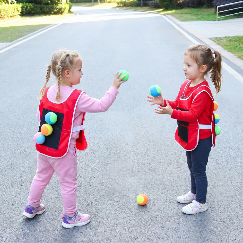 Sticky ball game encouraging running and dodging