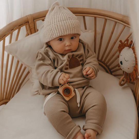 Baby lounge set with cheerful sun embroidery detail
