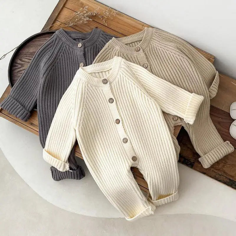 Soft knit romper keeps baby warm on cooler days